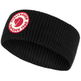 Branded and durable black winter headband with red fox logo and fjallraven Sweden 1960 written around fox logo.
