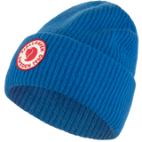 Woolen alpine blue hat or cap with red fox logo and with written fjallraven Sweden 1960 around it.