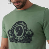 branded green wool winter men t-shirt with printing a fox logo and Fjällräven original written around it. 