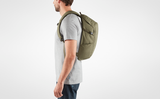 a boy wearing fjallraven water resistant backpack