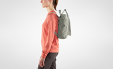 a girl carrying Kånken totepack on her back