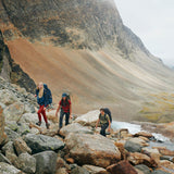 two girls and a guy wearing Fjällräven products are trekking